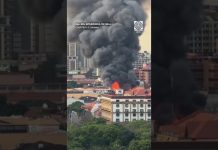 Kita mula sa isang condominium ang sunog na sumiklab sa Intramuros, Maynila nitong Miyerkoles.